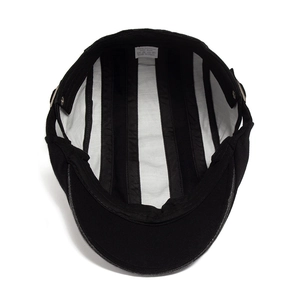 British vintage style black cotton flat cap with striped lining and cotton material tag