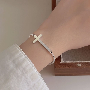 Minimalist S925 sterling silver cross charm bracelet with 2mm box chain on woman wrist
