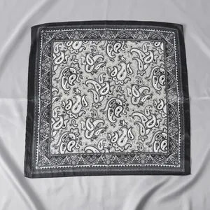 60x60cm square silk scarf featuring classic black and white paisley patterns with wide borders