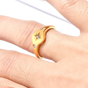 Luxurious 18K gold-plated signet ring for women featuring three sparkling inset diamonds
