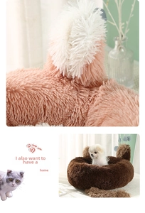 Close-up of soft plush texture and animal ear details on round pet bed for dogs and cats