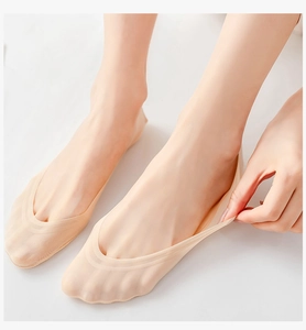 Close-up of nude ice silk invisible socks showing high elasticity and seamless skin fit