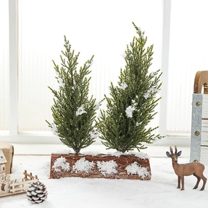 Mini artificial snowy Christmas tree decor on wood base with pine cones and needles