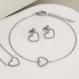 Three-piece stainless steel jewelry set with white heart shell pendants and fine chains