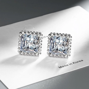 Square cubic zirconia stud earrings with intricate silver hollow carvings and beads