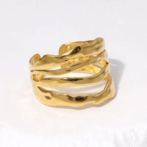 Minimalist 18K gold plated stainless steel layered ring with irregular wave pattern