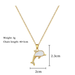 Macro view of shell dolphin pendant with measurements 2.3x2cm on a 40cm titanium steel chain