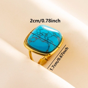 Detail showing dimensions of vintage square turquoise ring with golden band and open design