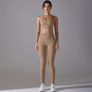 Front view of a high-waisted seamless yoga set including a crop top and matching leggings