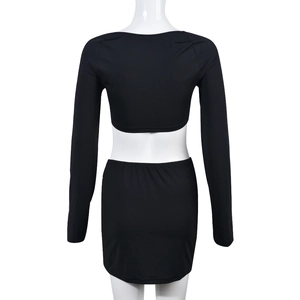 Rear view of black hollow-out long sleeve mini dress set with lace-up back detail