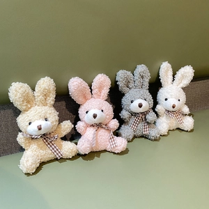 Cute plush rabbit keychains with plaid bows in beige, pink, grey and white colors