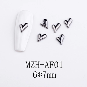 Detail view of 6x7mm 3D heart alloy nail charms with polished dark silver finish