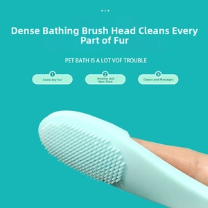Detail of light blue silicone pet brush with dense round bristles for dental care