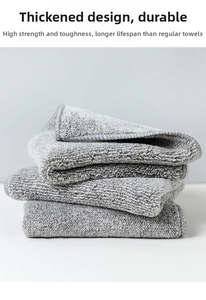 Detail of thickened dark grey bamboo charcoal fiber dishcloth showing soft texture and edges
