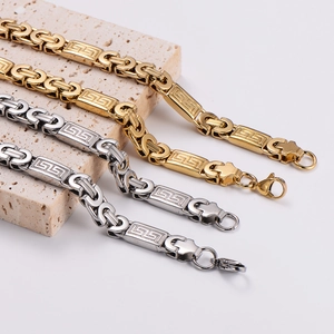 Gold and silver stainless steel Byzantine chain bracelets with Greek fret patterns