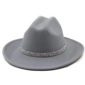 Close-up of grey wool fedora hat with sparkling rhinestone chain band decoration