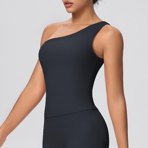 Close-up of black one-shoulder sports bra with seamless brushed fabric for fitness