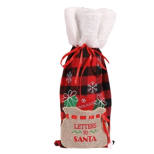 Red and black buffalo plaid Christmas wine bottle cover with white faux fur and embroidery
