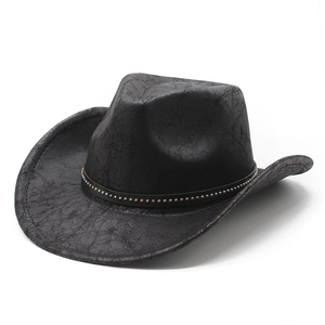 Vintage black western cowboy hat with cracked texture and studded band on white background