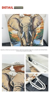 Close-up of elephant embroidery tapestry detail and cotton rope handle on canvas tote bag