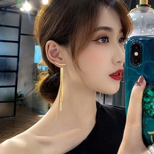 Elegant gold snake chain tassel earrings for women with long linear fringe design