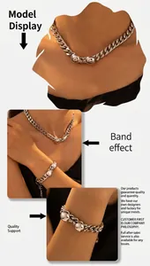 Detail of silver curb chain set with polished metal balls on model's neck and wrist