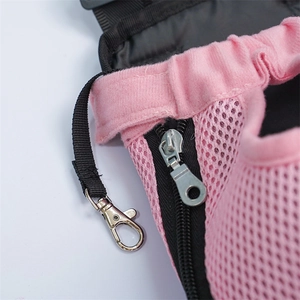 Detail of pink breathable mesh fabric, heavy-duty zipper and silver metal hook for pet carrier