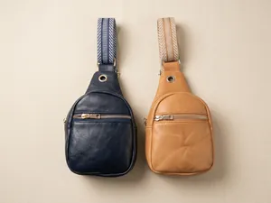 Detail view of stylish faux leather chest bags with wide geometric woven shoulder straps