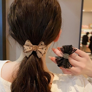 Polka dot mesh bow scrunchie with rhinestones for high ponytail hair styling
