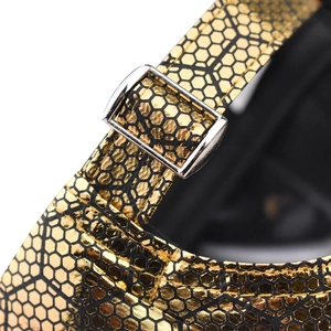 Macro view of adjustable silver metal buckle on honeycomb textured baseball cap strap