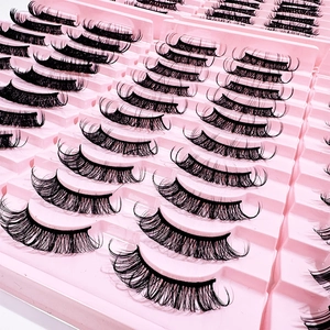 Ten pairs of dense Russian volume false eyelashes in a pink tray for makeup extension