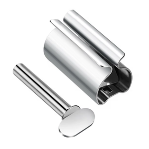 Polished stainless steel tube squeezer showing the fixed base and manual metal handle key