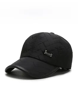 Detail of black winter baseball cap with diamond stitching and metal JEANS emblem