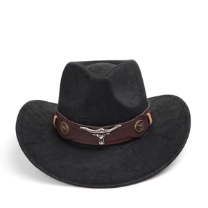 Detail of vintage black suede cowboy hat featuring a silver bull head metal ornament