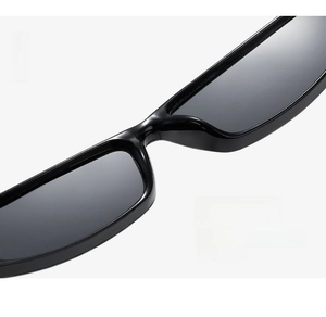 Macro detail of ergonomic nose pads on vintage rectangle black sunglasses frame