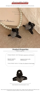 Detail of a small heart rhinestone hair claw clip with measurements 4.5cm and 8.7g weight