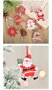 Detail of wooden Christmas pendants featuring Santa and Reindeer on a cozy festive table