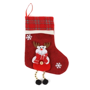 Christmas stocking candy bag featuring a reindeer doll and snowflake on white background