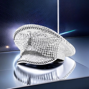 Detailed view of silver bridal military hat with sparkling sequins and rhinestones