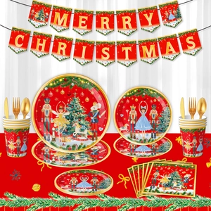 Christmas Nutcracker party tableware set with banner plates cups and cutlery on red cloth