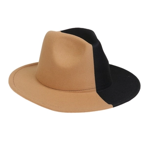Detail of the high-quality wool felt texture on a khaki and black two-tone fedora hat