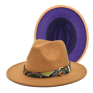 Close-up of camel wool fedora with snake pattern band and elegant purple lining