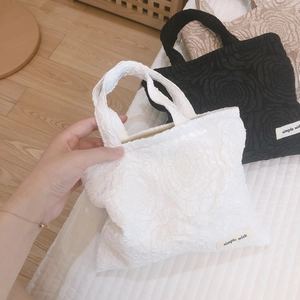 Mini handbag with 3D rose floral texture and zipper closure in white, black and beige