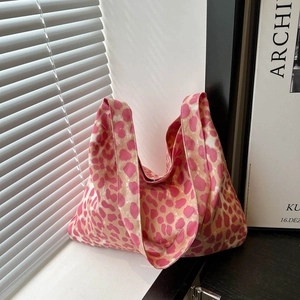 Pink leopard print canvas tote bag for women with large capacity in soft sunlight
