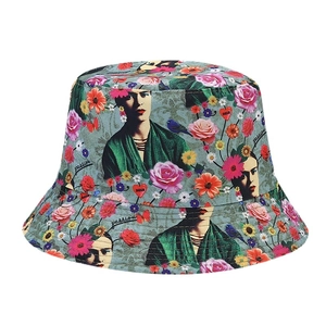 Double-sided reversible bucket hat featuring Frida Kahlo portrait and rose floral prints
