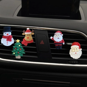 Christmas themed car vent clips featuring Santa Claus Snowman and Reindeer decorations