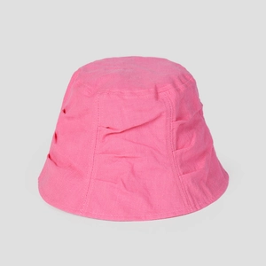 Detail view of pink linen fisherman hat showing casual pleat design and breathable fabric