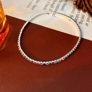 Rainbow tennis bracelet with colorful square zircon stones on elegant vintage background