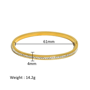 Detailed view of gold plated bangle with dimensions 61mm diameter and 4mm width