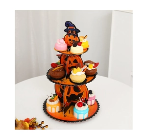 Three-tiered Halloween cardboard cupcake stand with orange jack-o'-lantern and bat graphics